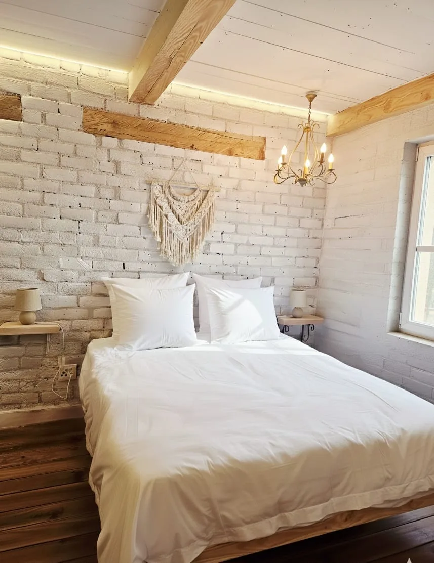 Ibiza Room — white brick walls and timber beams