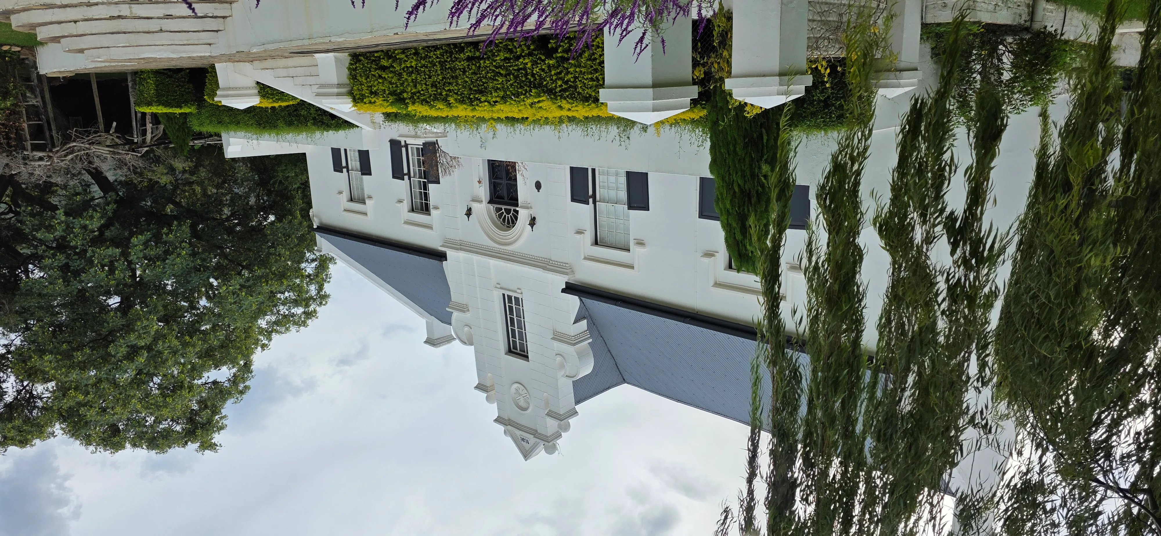 Wolwekloof Estate — manor house with lavender and reflecting pool